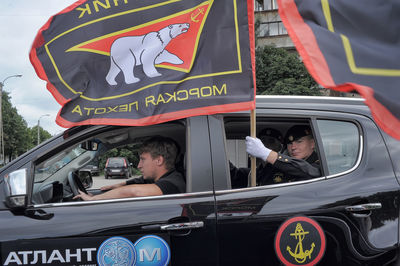 High angle view of people on car