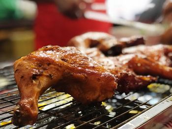 Close-up of meat on barbecue grill