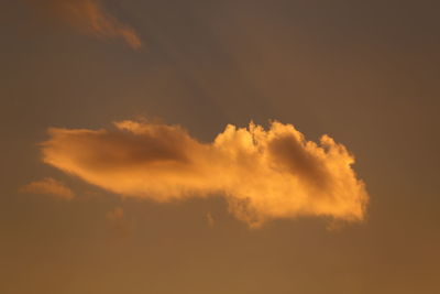 Low angle view of clouds in sky during sunset