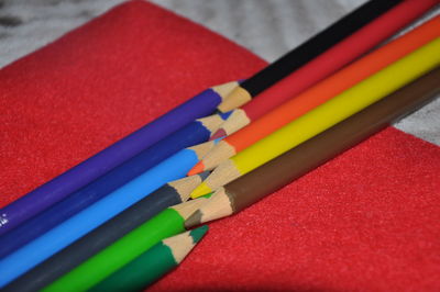 High angle view of multi colored pencils on table