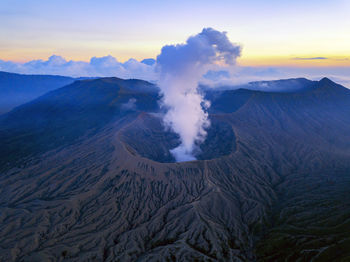 Smoke emitting from volcanic mountain at bromo tengger semeru national park, east java, indonesia