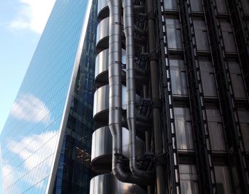 Low angle view of modern building against sky