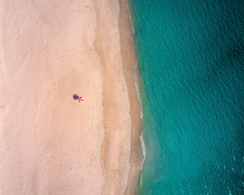 High angle view of umbrella on beach