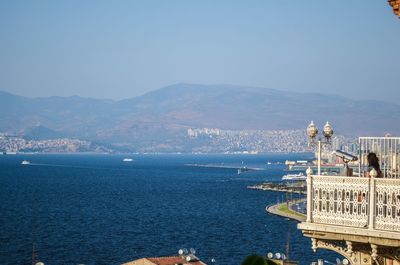 Scenic view of sea with mountains in background