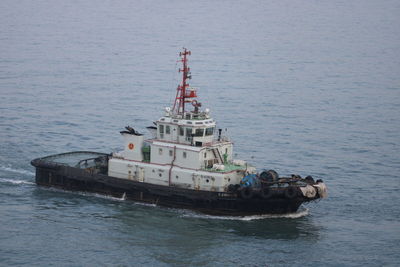 High angle view of ship sailing in sea