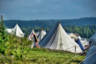 Panoramic view of tent on field against sky