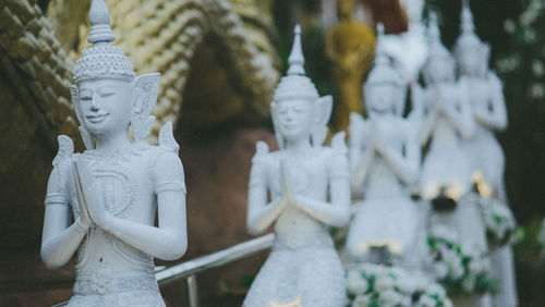 Close-up of buddha statue in temple