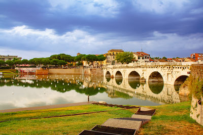 Bridge over river against sky