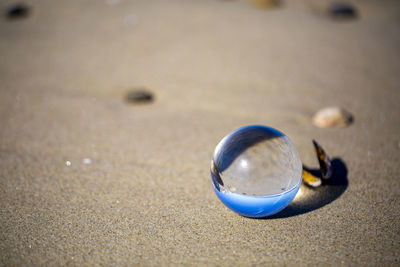 High angle view of ball on beach