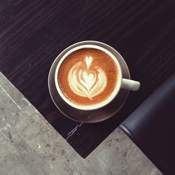 High angle view of cappuccino on table