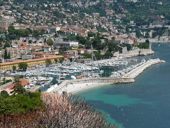 High angle view of boats moored at harbor