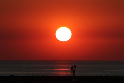 Scenic view of sunset over sea