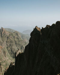 Scenic view of rocky mountains against clear sky