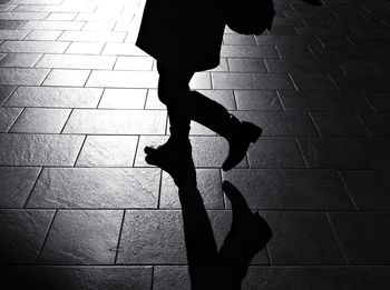 Shadow of person standing on wall