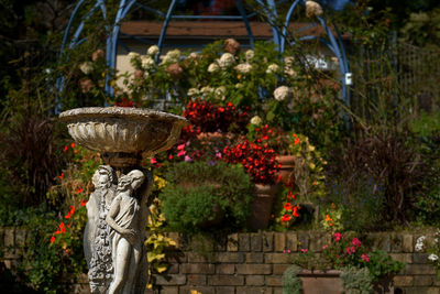 Statue of flowers in garden