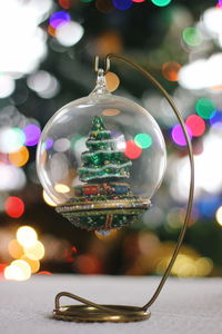 Close-up of illuminated christmas lights on table