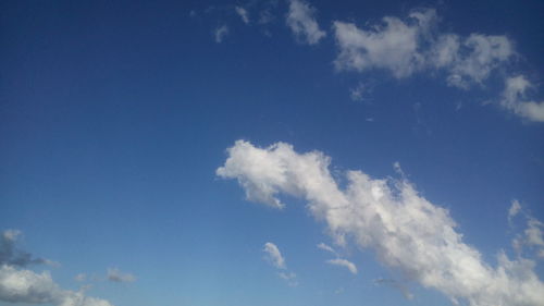 Low angle view of clouds in blue sky