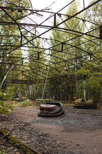 Nautical vessel in water against trees in forest