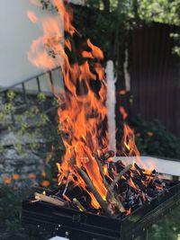 Close-up of bonfire on barbecue grill