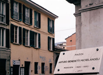 Information sign on roof of building in city