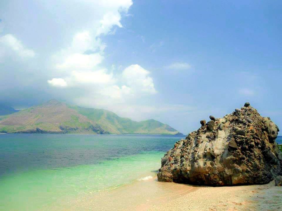 water, sea, cloud - sky, scenics - nature, mountain, beauty in nature, rock, sky, tranquility, land, nature, tranquil scene, rock - object, beach, no people, solid, day, idyllic, outdoors, bay, mountain peak