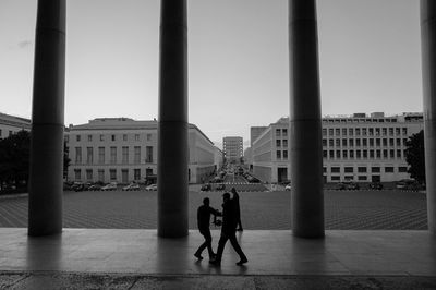 People in front of historical building