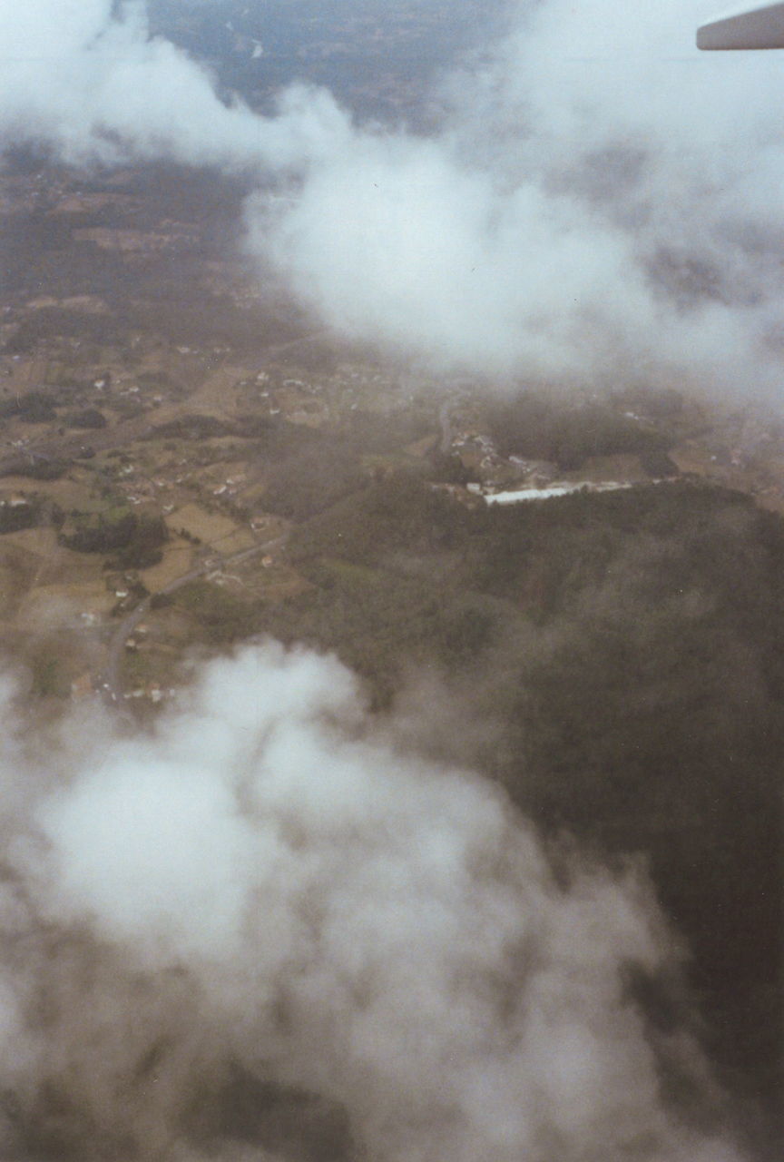 AERIAL VIEW OF CLOUDSCAPE OVER MOUNTAIN