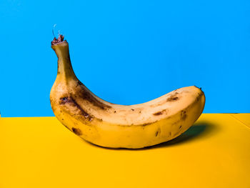 Close-up of bananas against blue background