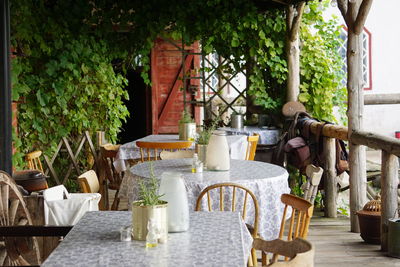 Chairs and tables at outdoor restaurant