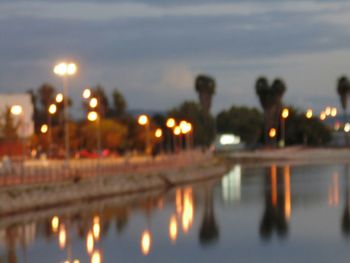 Reflection of illuminated buildings in water