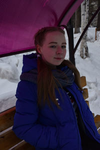 Portrait of woman in snow