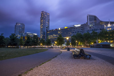 Illuminated city against sky at night