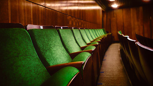 Close-up of empty seats in room
