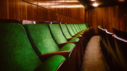 Close-up of empty seats in theater