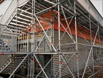 A scaffolding around  a building.