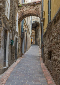 Narrow alley along buildings