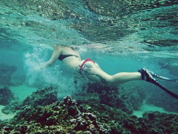 Man swimming in sea