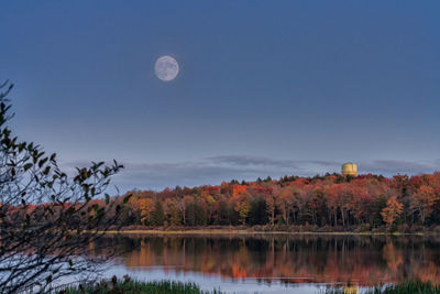 Scenic view of lake against sky during autumn