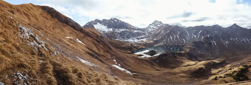 Scenic view of arid landscape during winter