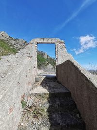 Low angle view of castle against blue sky