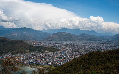 The cityscape of pokhara with the annapurna mountain range central nepal, asia