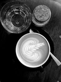 Directly above shot of coffee cup on table