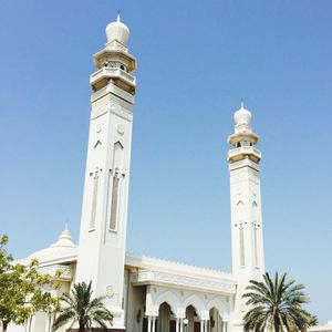 Low angle view of cathedral against clear blue sky