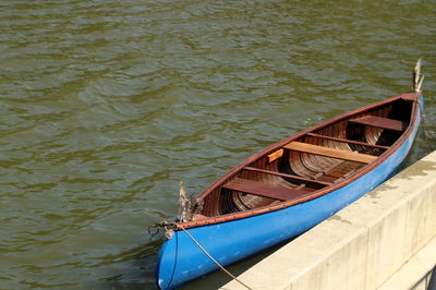 High angle view of boat moored in lake