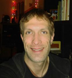 Portrait of smiling young man at home