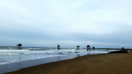 Scenic view of beach against sky