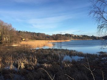 Scenic view of lake against sky