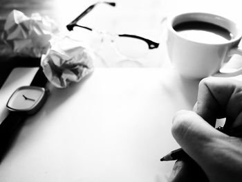 Close-up of coffee cup on table