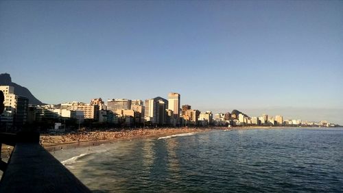 Buildings in distance with waterfront