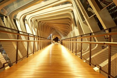 Illuminated footbridge at night